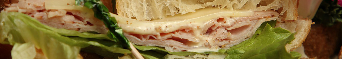 Eating Deli Sandwich at Tommy Pastrami New York Delicatessen restaurant in Santa Ana, CA.
